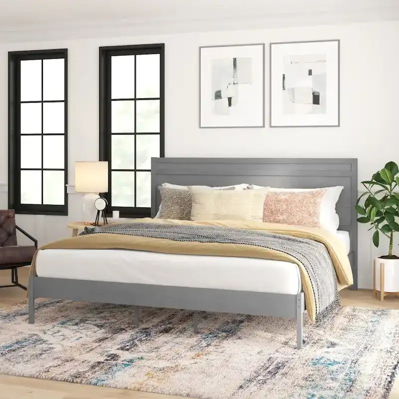 Letto a piattaforma in legno massello con testiera e doghe in legno