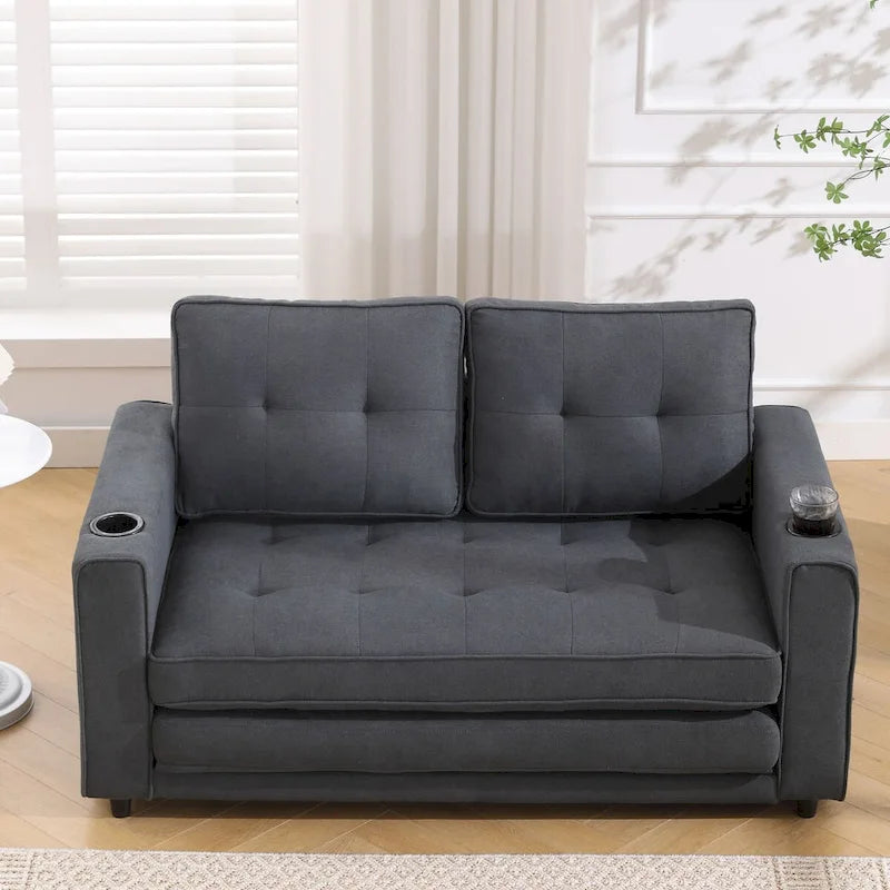 Divano futon imbottito con letto estraibile, divanetto capitonné pieghevole disponibile in vari colori, con portabicchieri