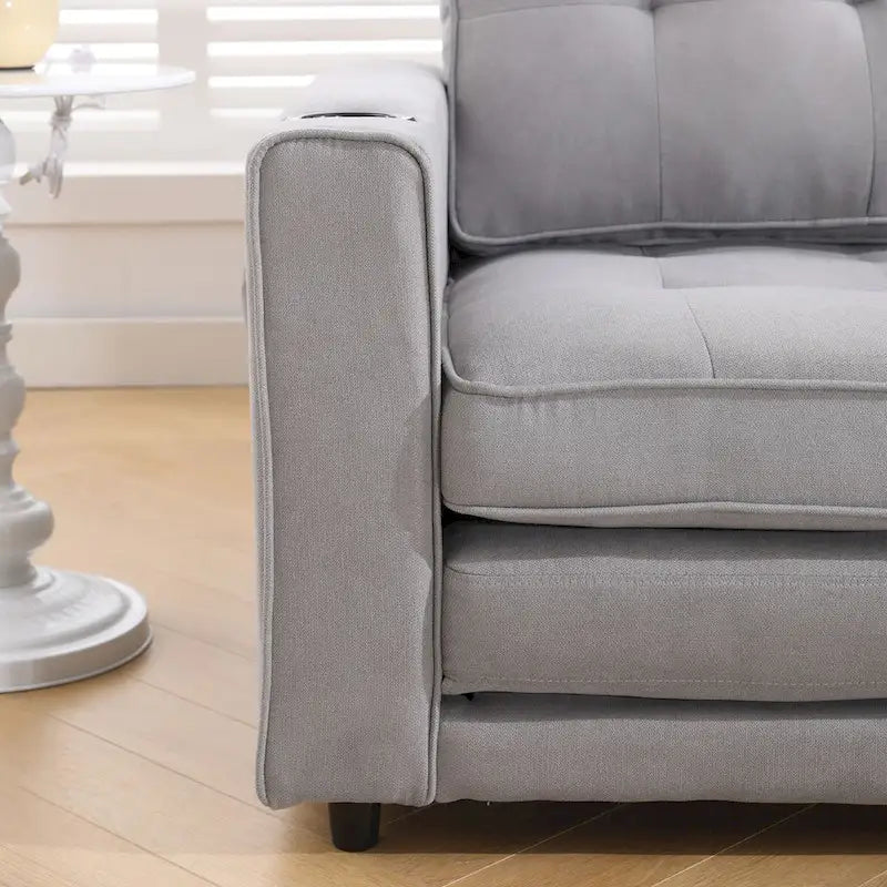 Divano futon imbottito con letto estraibile, divanetto capitonné pieghevole disponibile in vari colori, con portabicchieri