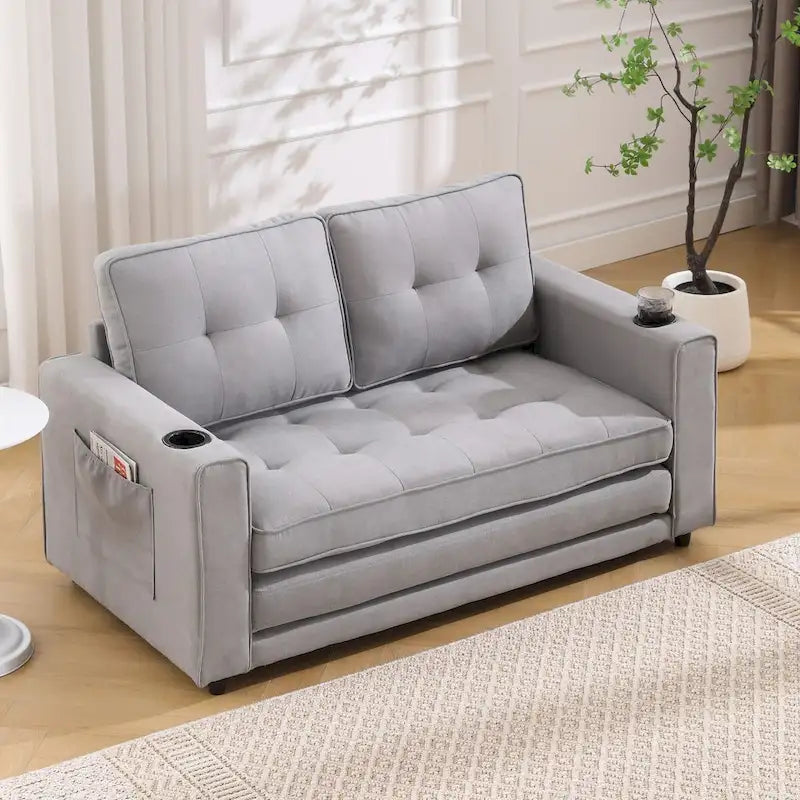Divano futon imbottito con letto estraibile, divanetto capitonné pieghevole disponibile in vari colori, con portabicchieri